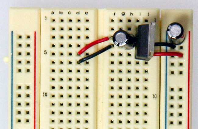 Add the 7805 and decoupling capacitors